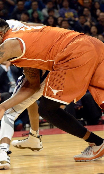 Washington holds off Texas 77-71 in historic game in China
